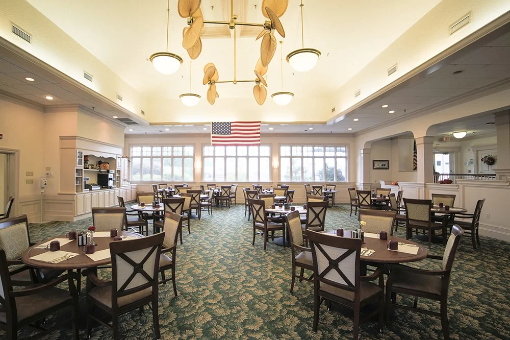 Dining area with tables and American flag