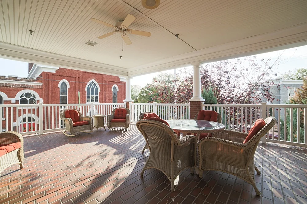 Outdoor seating area with wicker furniture