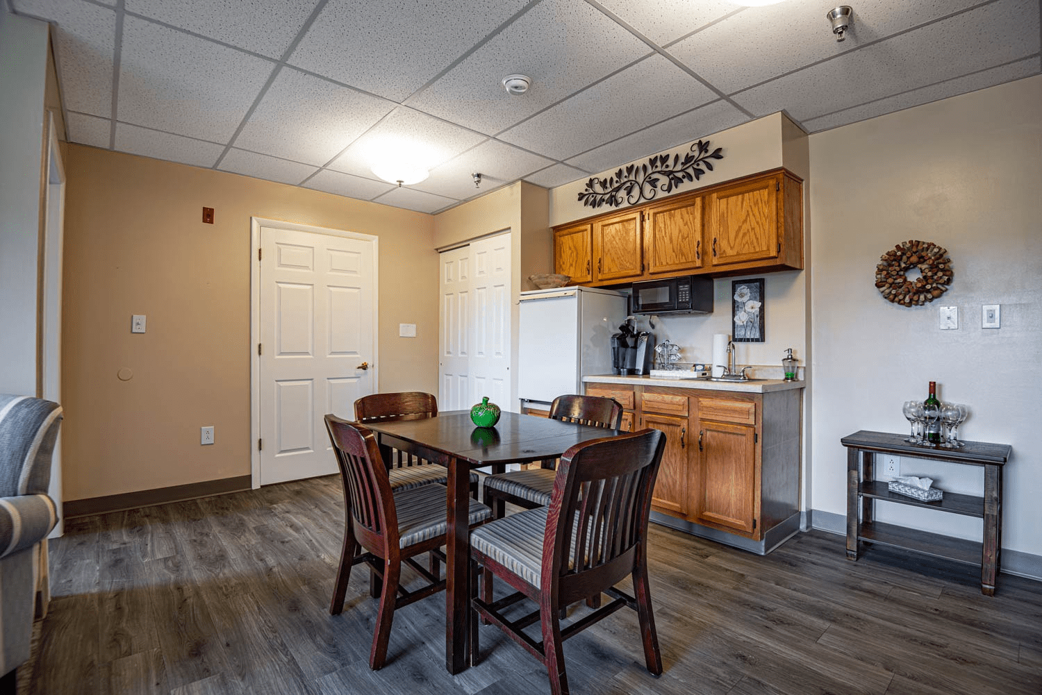 Cozy apartment interior with dining setup.