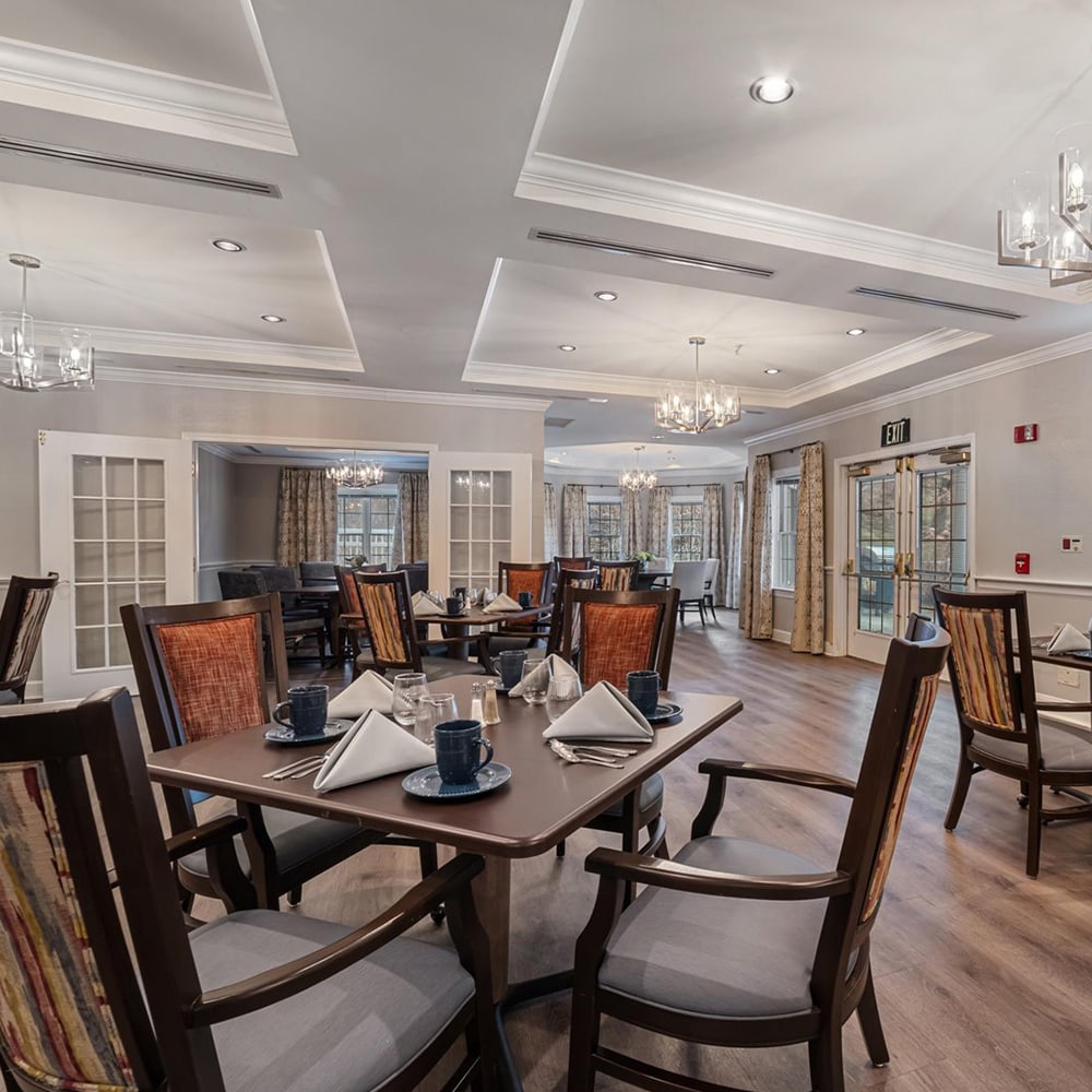 Dining area with tables set for a meal