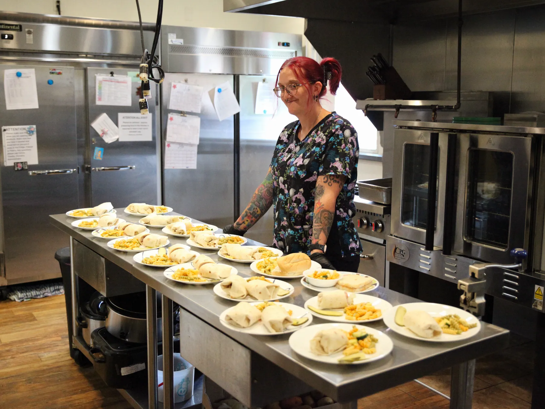Staff preparing meals in the facility's kitchen.