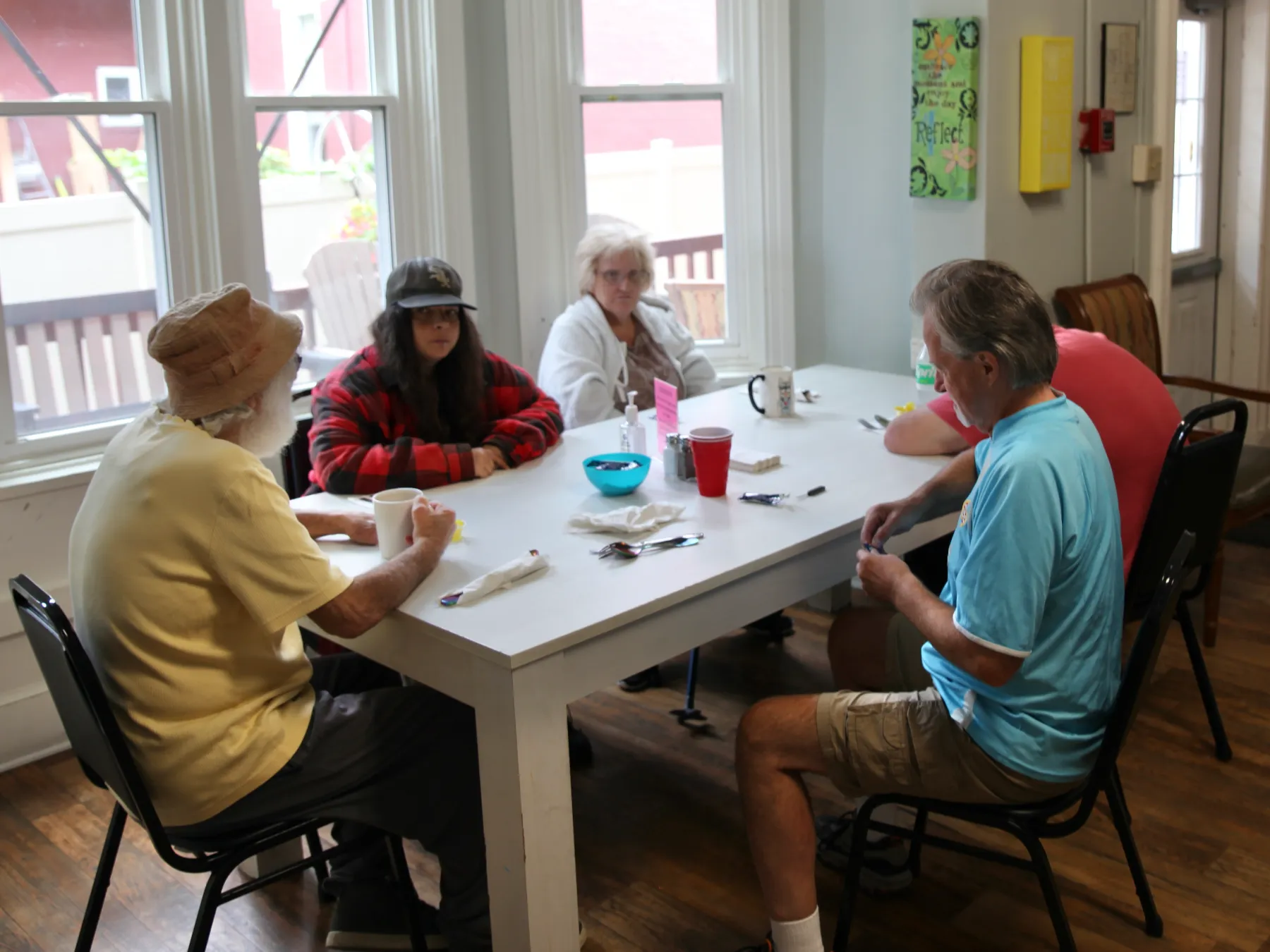 Residents enjoying time together in a dining area