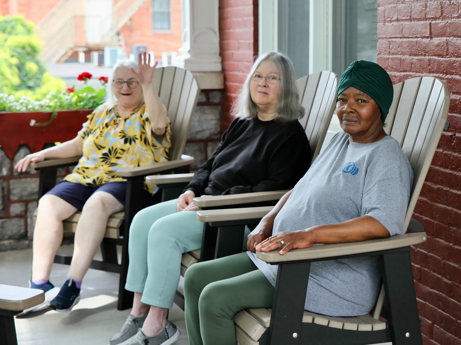 Residents enjoying time on the porch together.