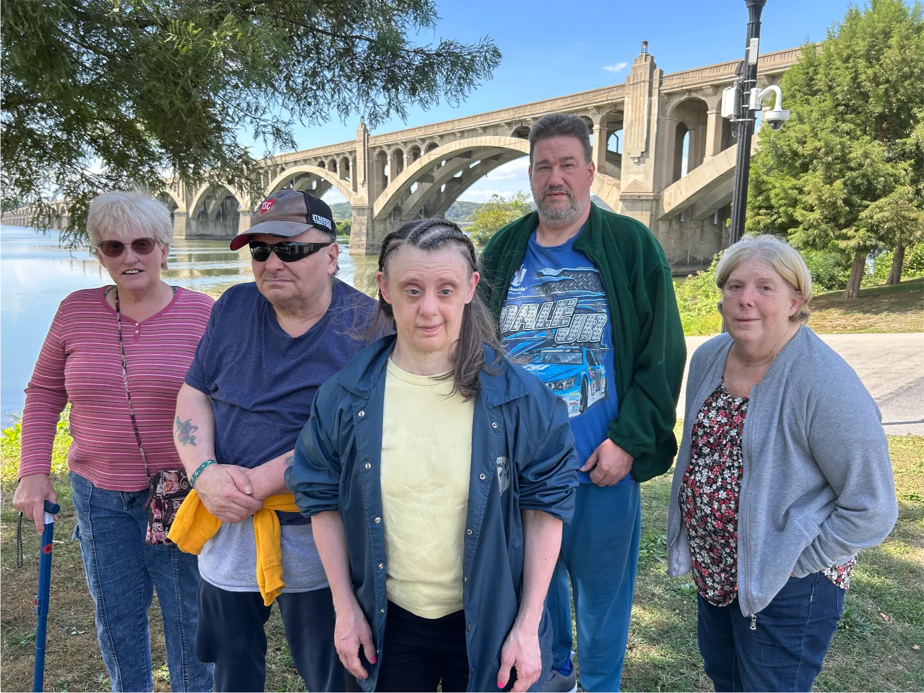 Group of residents enjoying a day outdoors by the water.