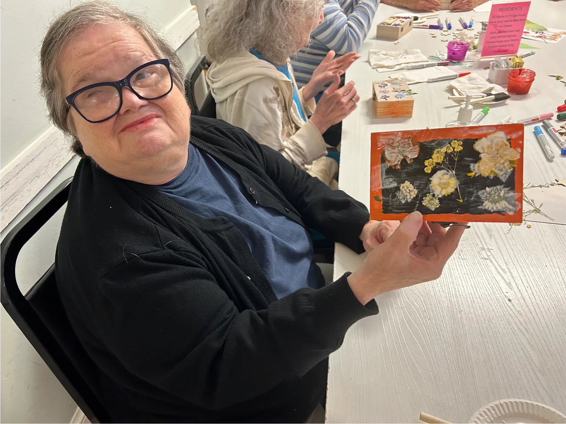 Resident engaged in an art activity.