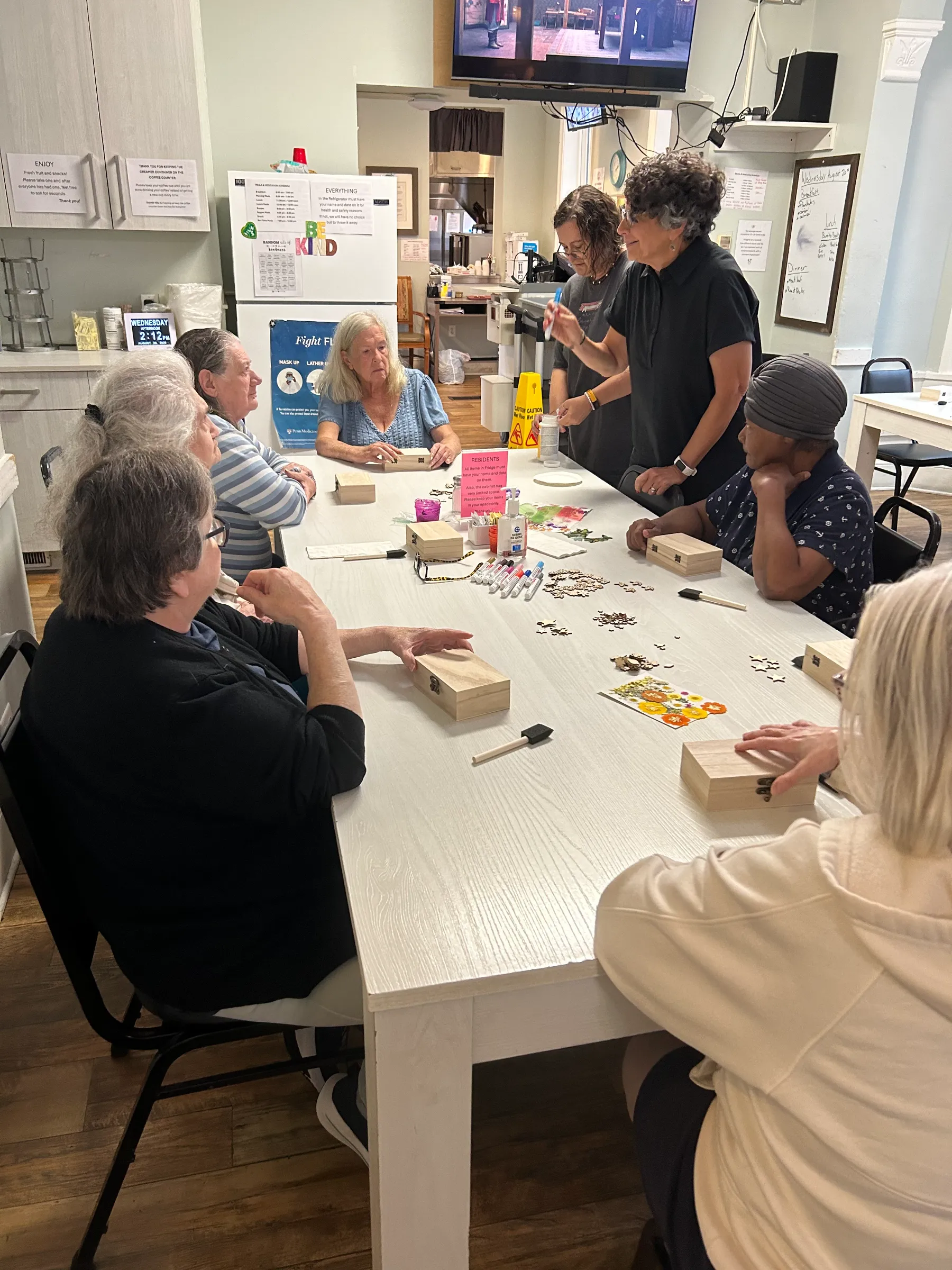 Residents engaging in an arts and crafts activity.