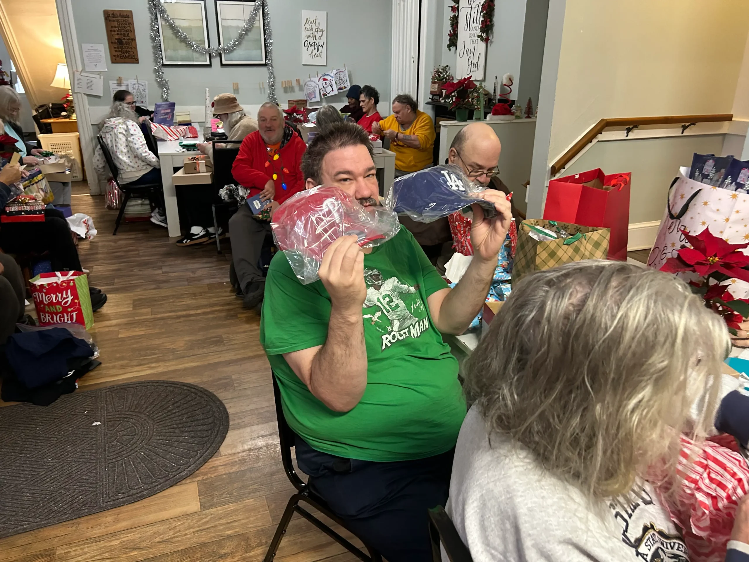 Residents celebrating with gifts and decorations