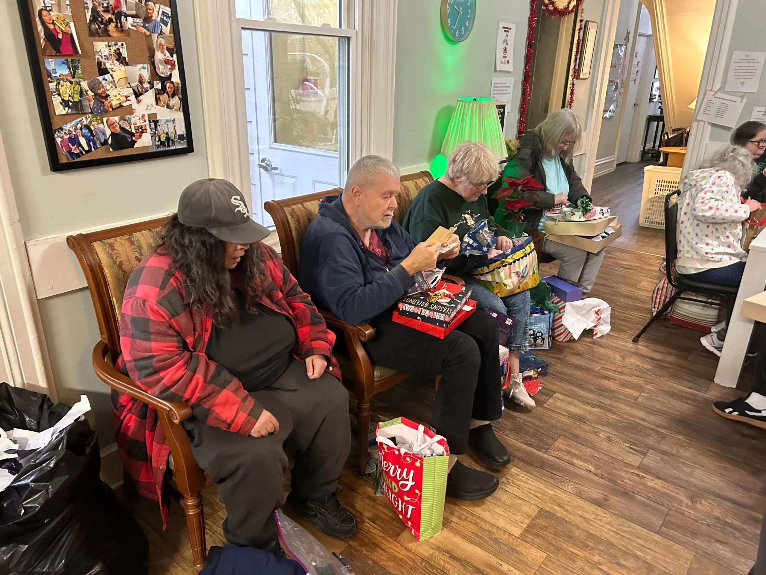 Residents engaged in an activity together indoors.