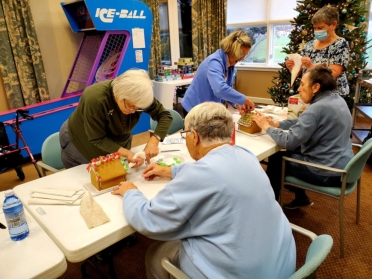 Residents engaged in a holiday activity together.