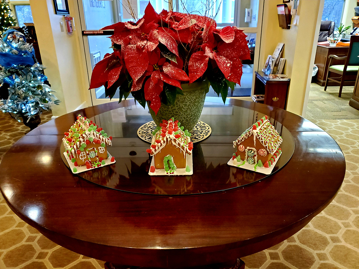Holiday-themed gingerbread houses on a table