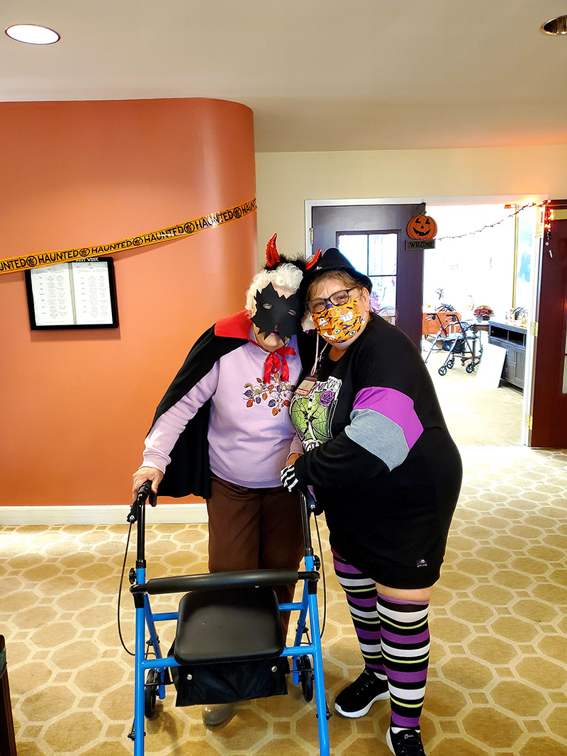 Residents enjoying a festive Halloween celebration.