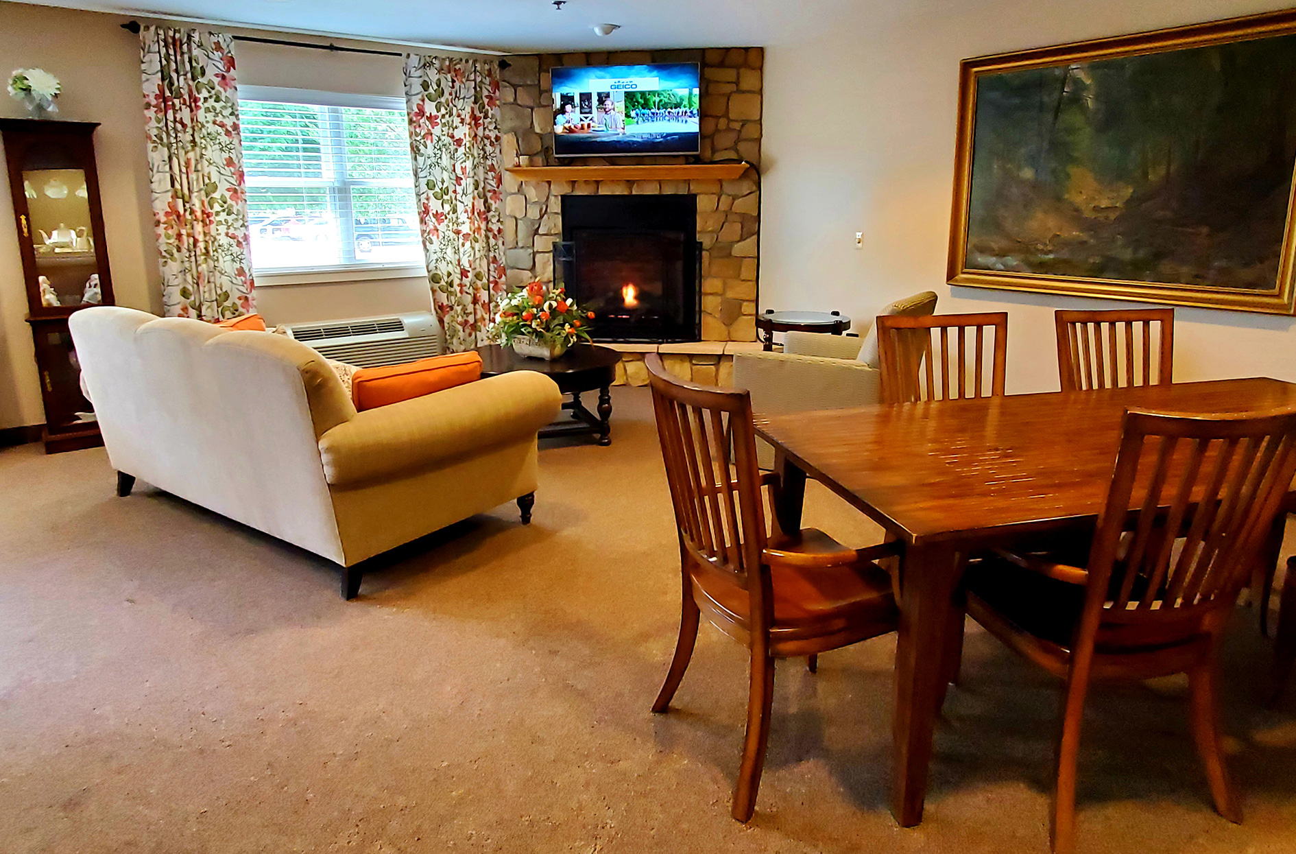 Common area with seating and a TV