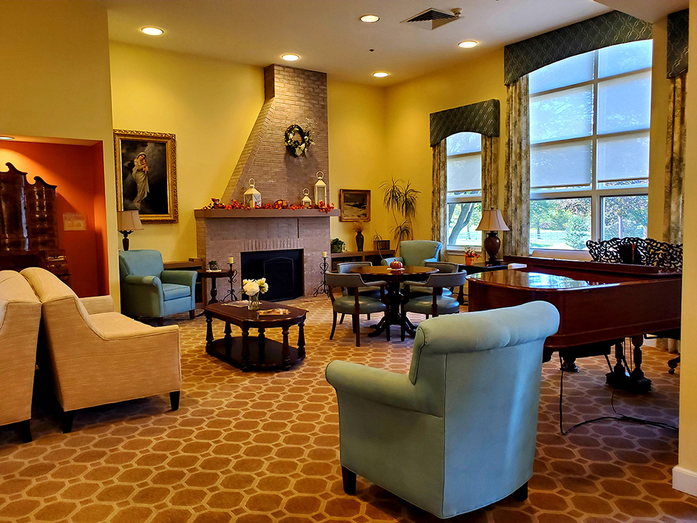 Cozy common area with seating and piano