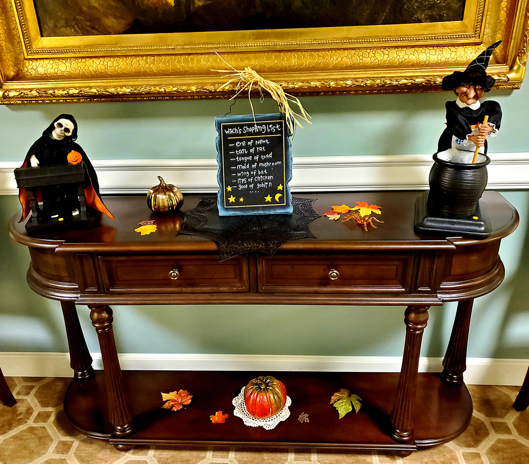 Decorative console table with Halloween decorations