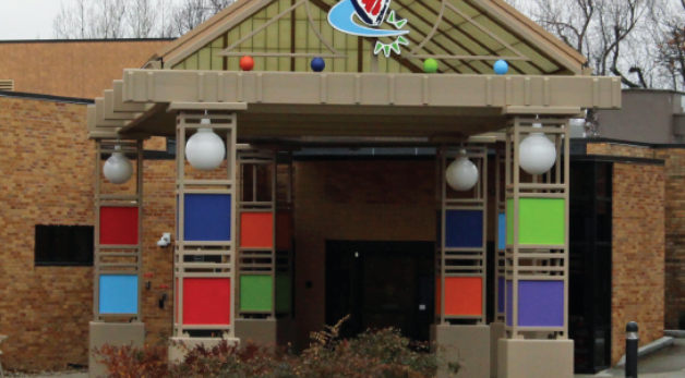Entrance of a nursing home with colorful design elements.
