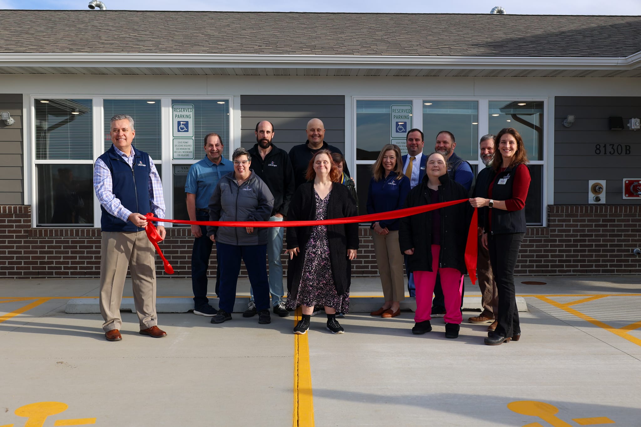 Ribbon-cutting ceremony for facility opening.