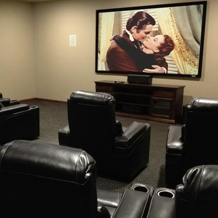 Comfortable theater area with leather seating