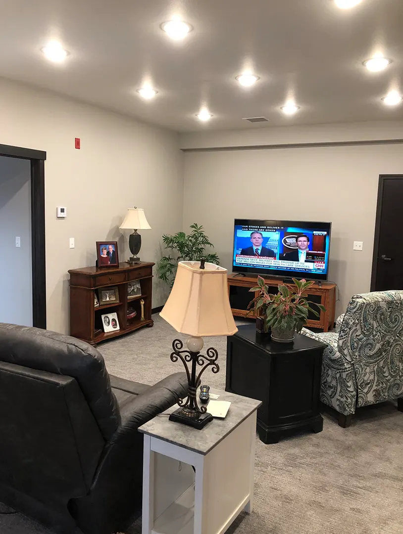 Interior common area with seating and TV