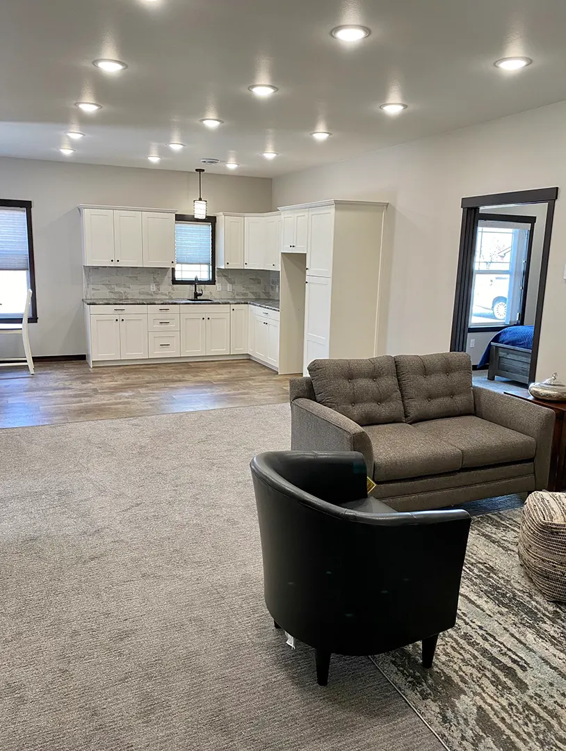 Spacious common area with a modern kitchen setup