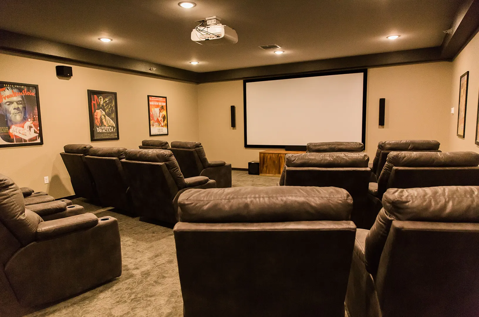 Comfortable movie theater seating in a common area.