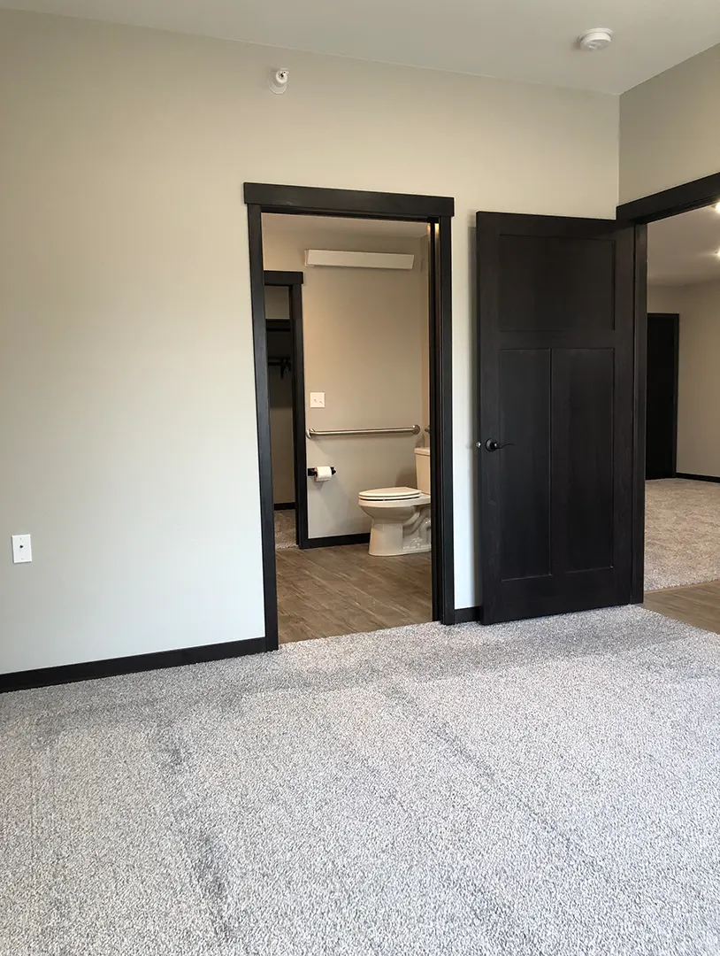 Interior view of a resident room with bathroom