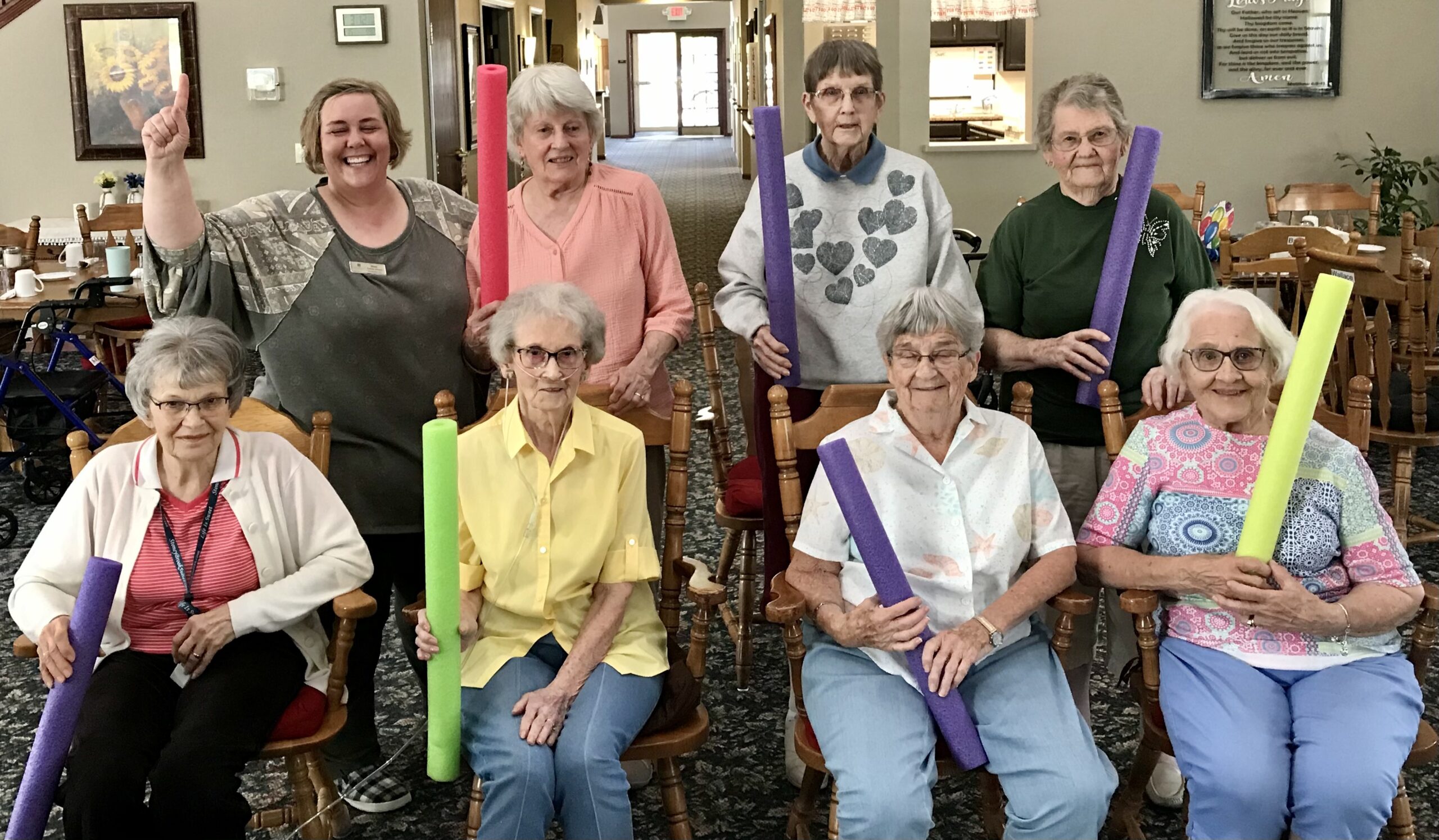 Residents participating in a fun exercise class