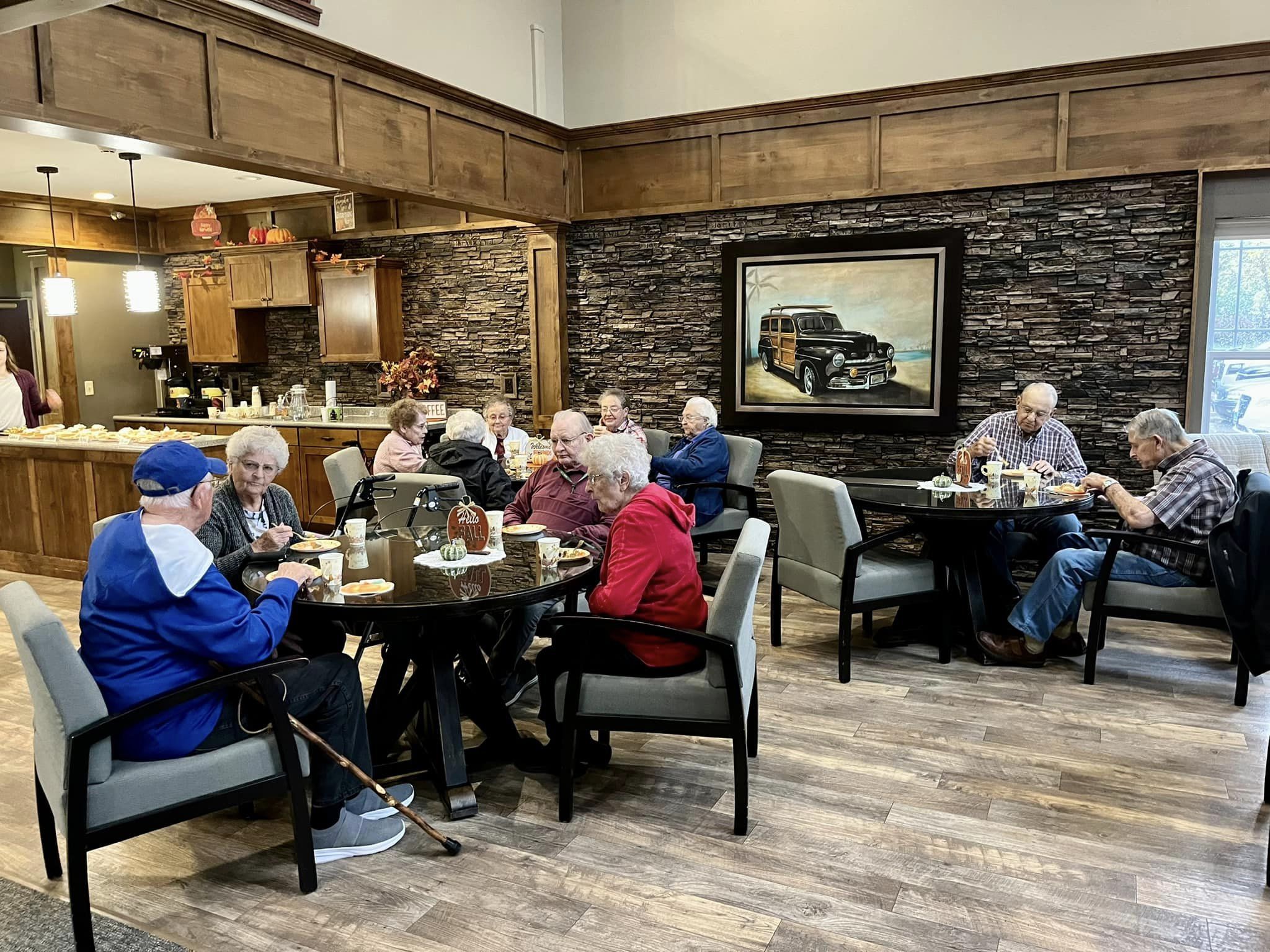Residents enjoying a meal in a common dining area.
