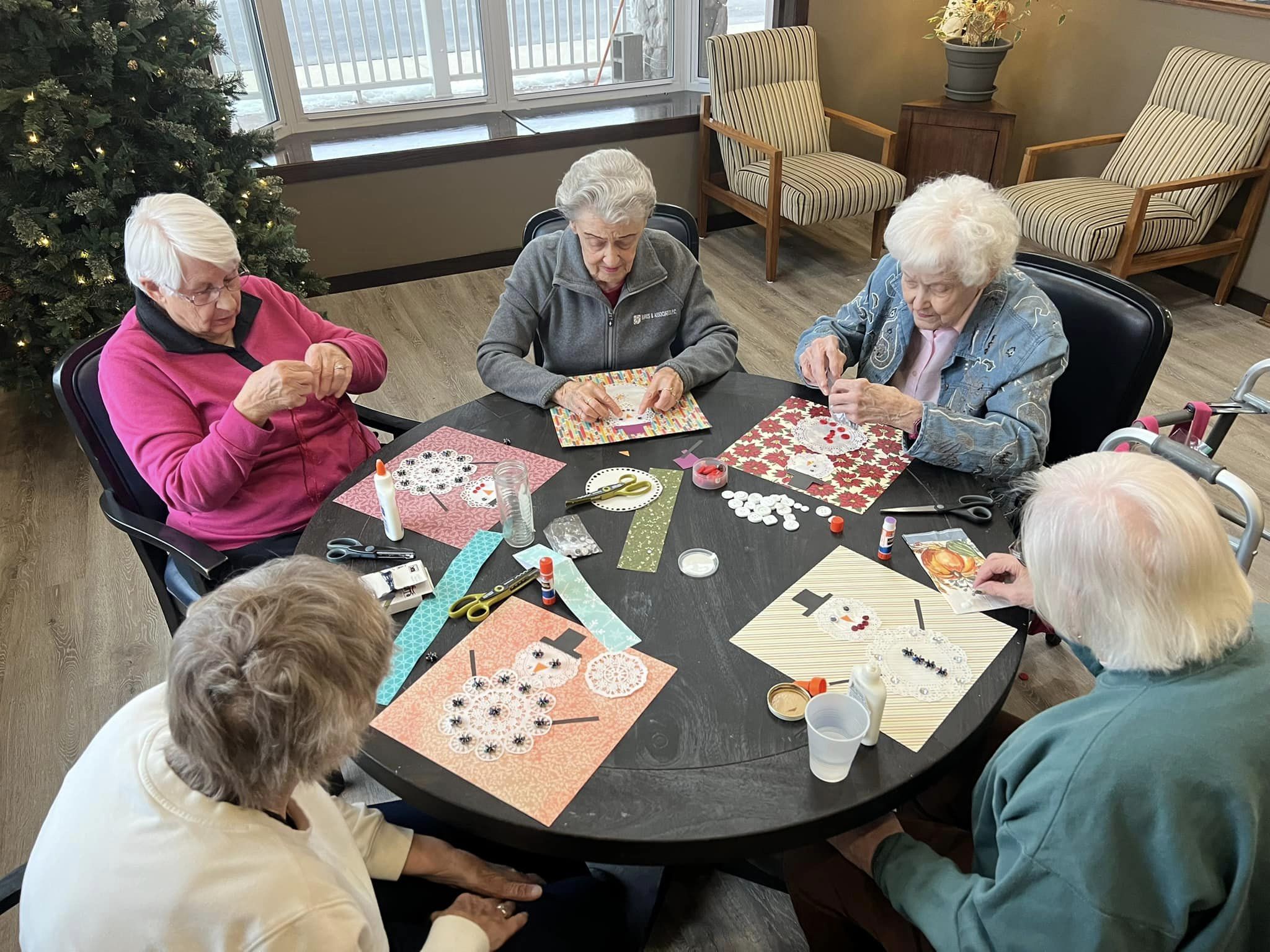 Residents engaged in an arts and crafts activity.