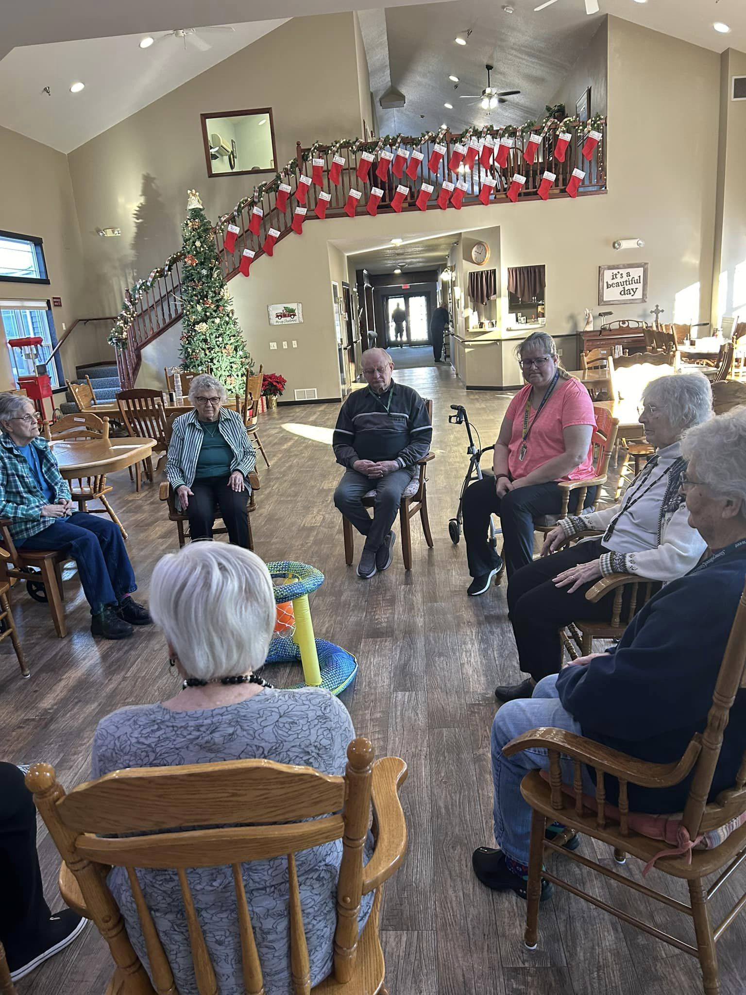 Residents engaged in a group activity indoors.