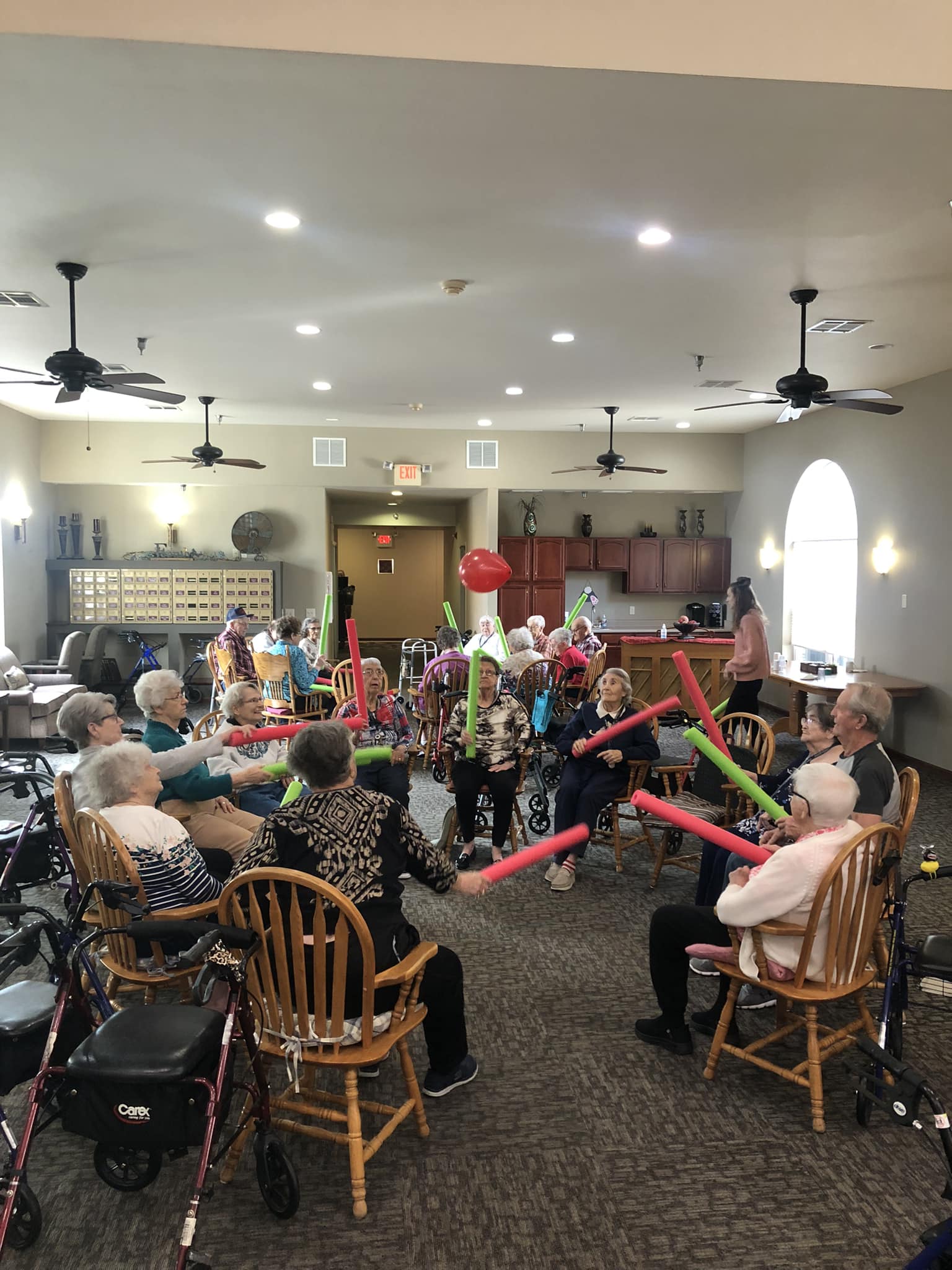 Residents engaging in a fun indoor activity.