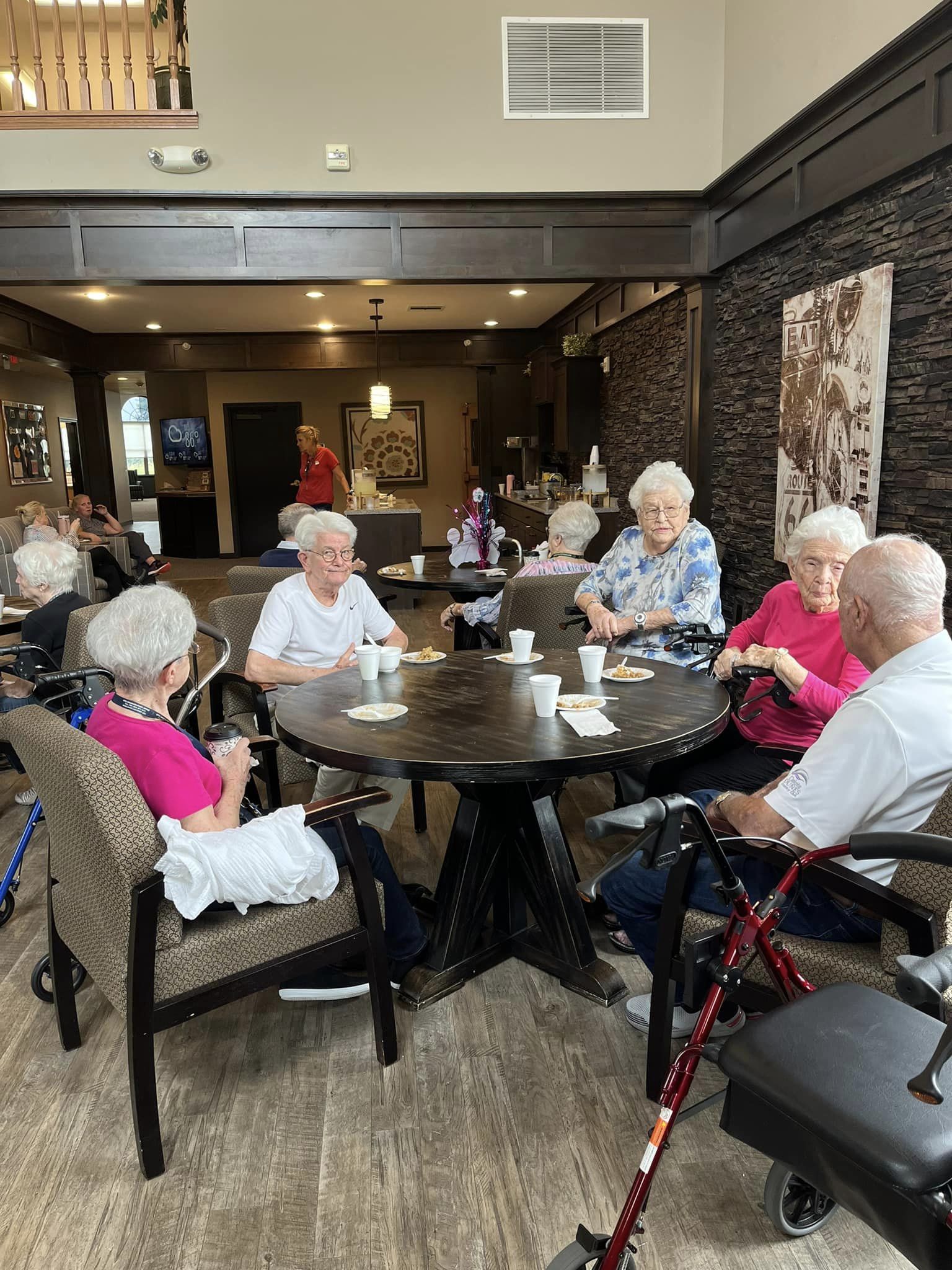 Residents enjoying a social gathering in a common area.