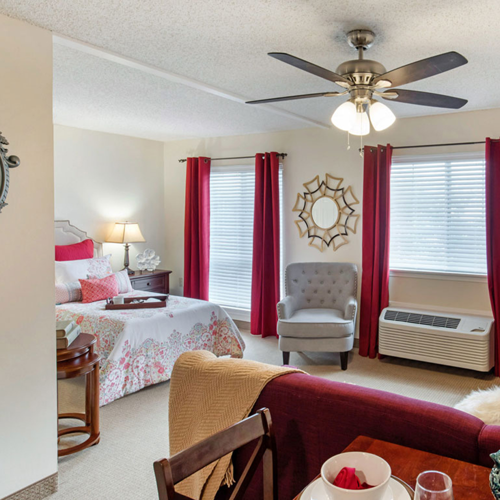 Cozy interior of a resident room with warm decor.
