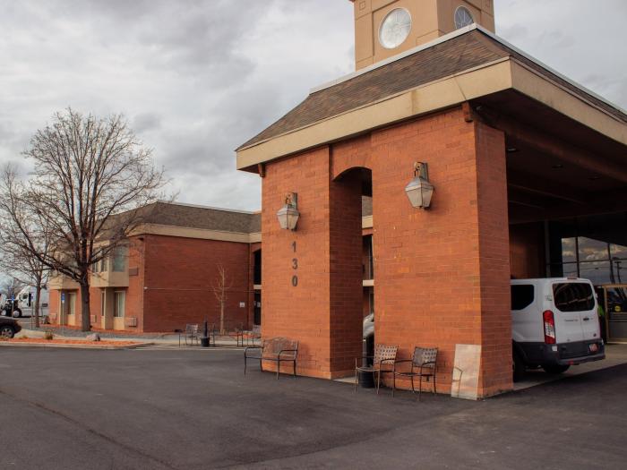 Exterior view of the facility entrance and parking area.