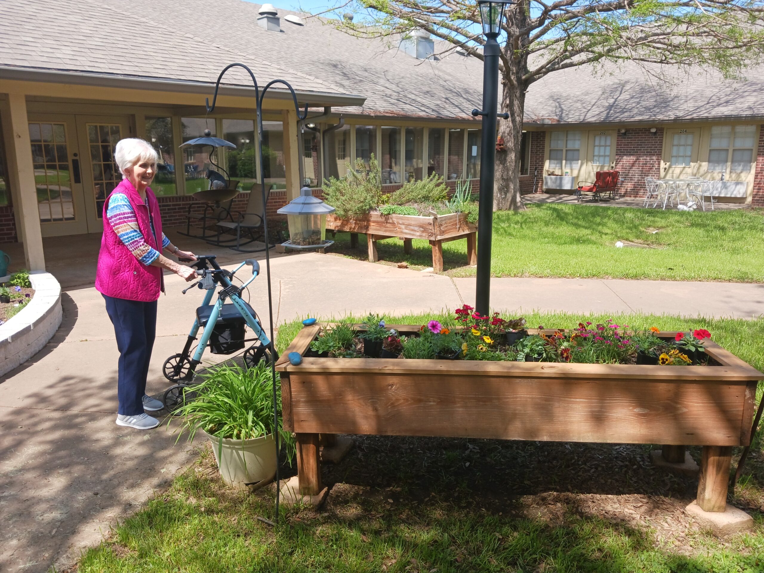 Senior woman gardening in outdoor space