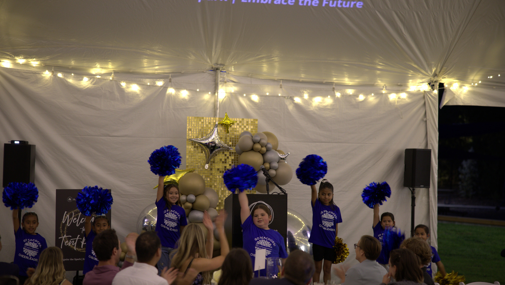 Children performing at a community event
