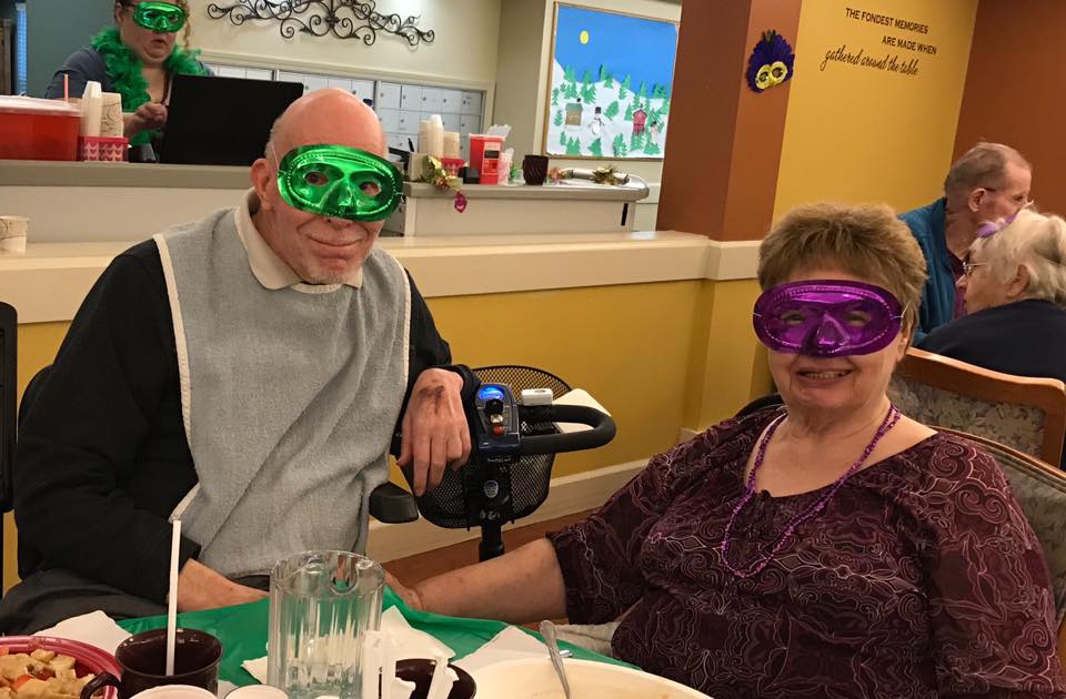 Residents enjoying a festive event with masks