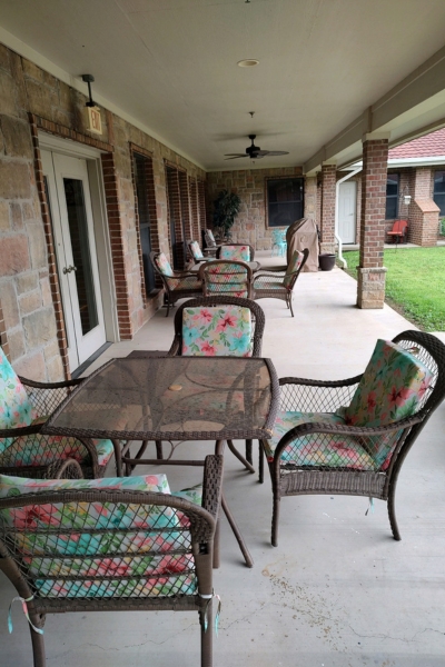 Covered patio area with seating
