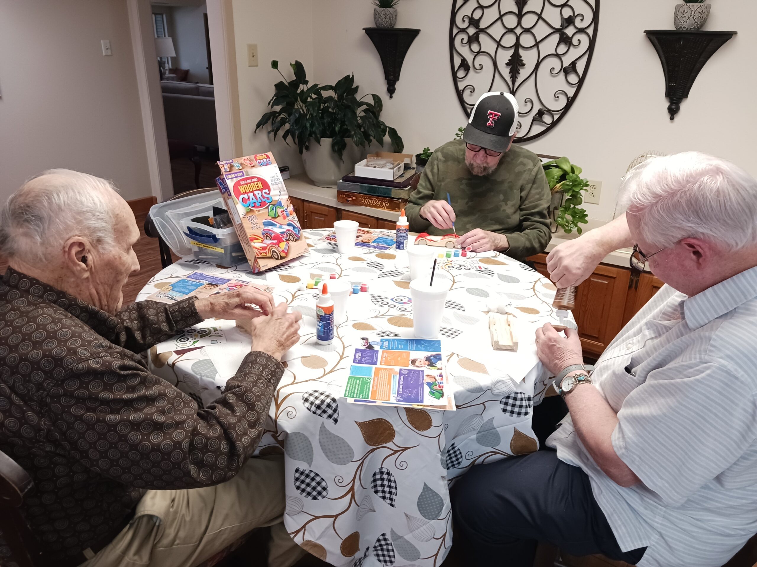 Residents engaging in an arts and crafts activity.