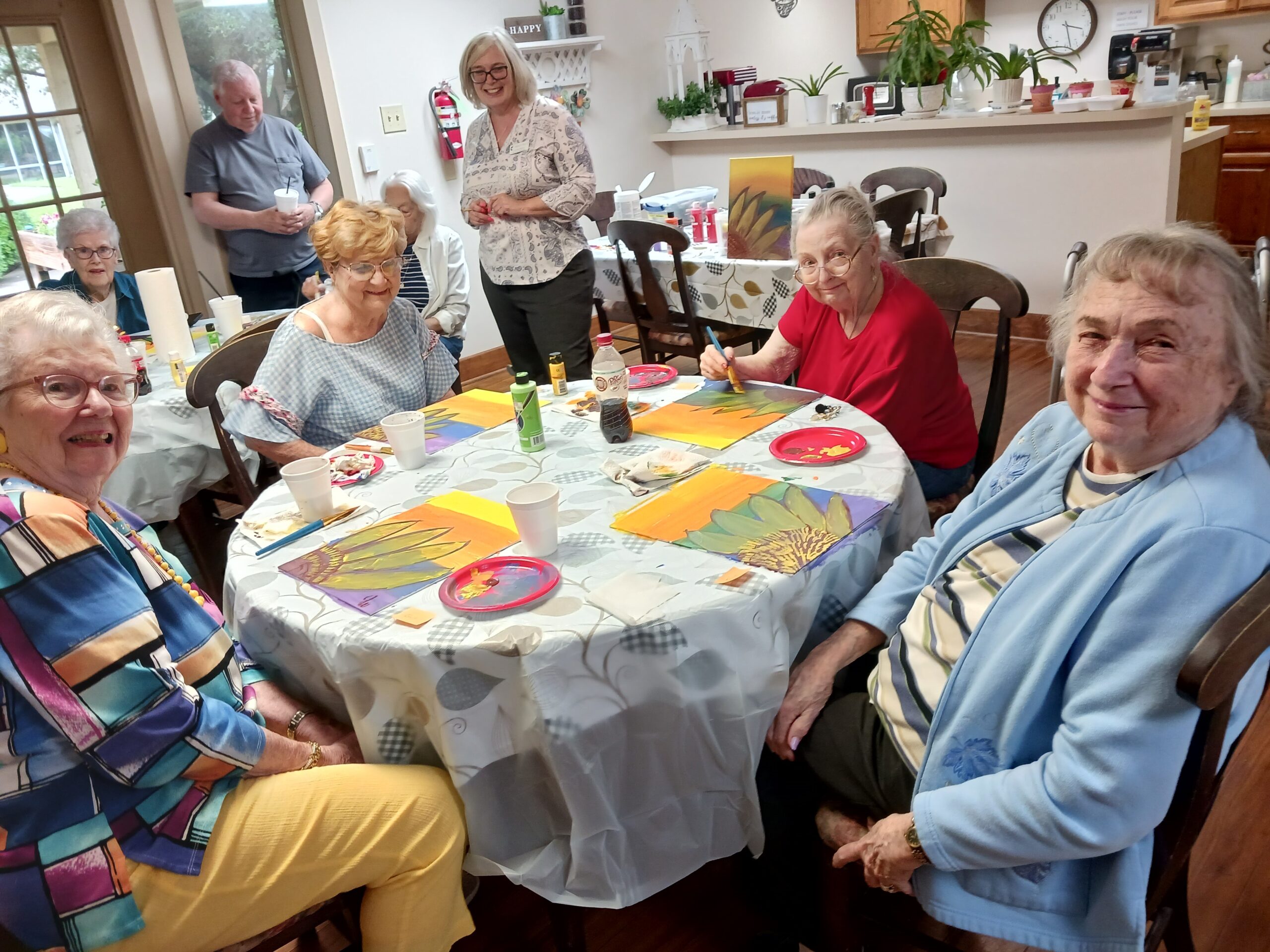 Residents engaged in an arts and crafts activity.