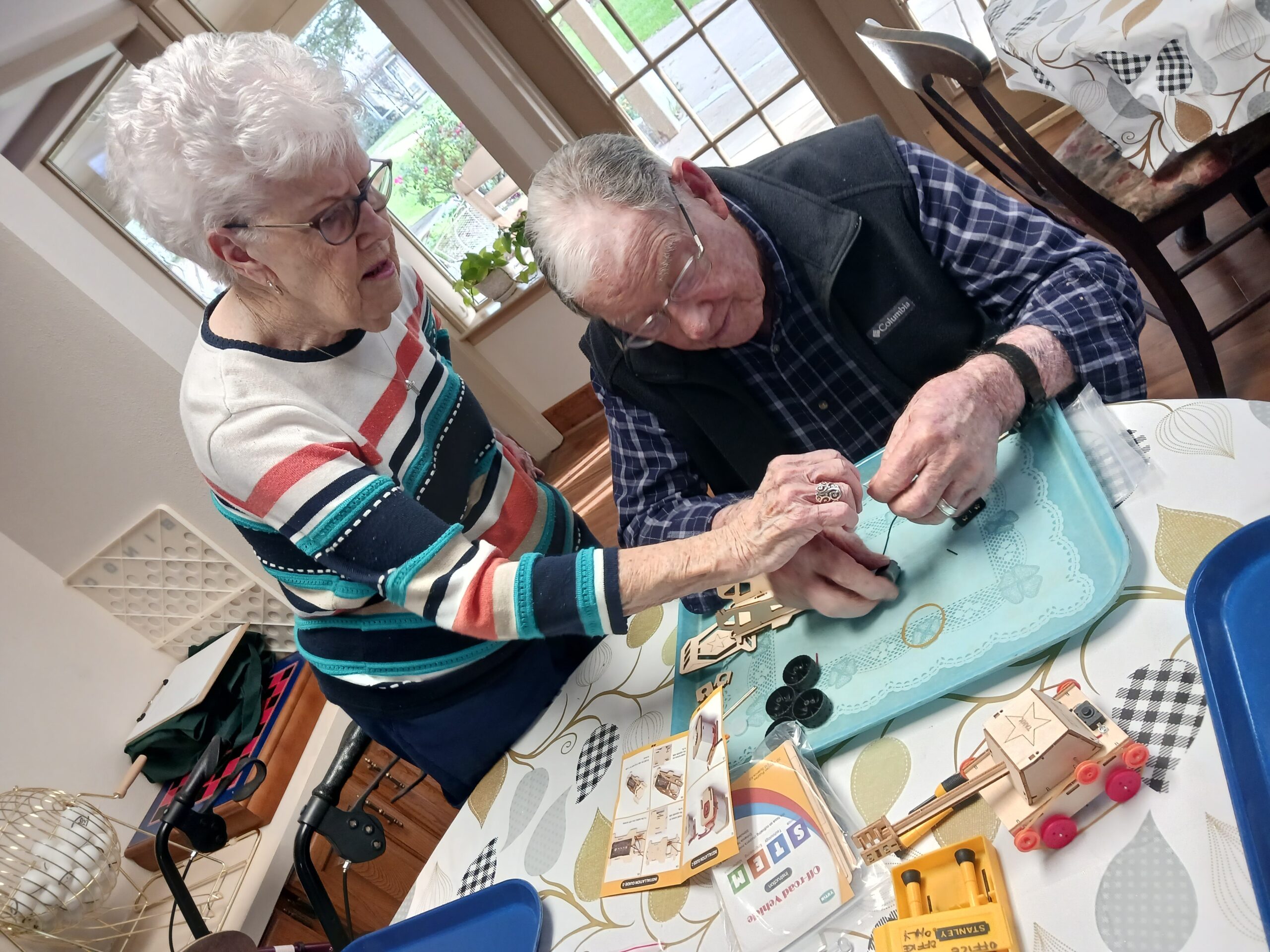 Two residents engaging in a group activity.