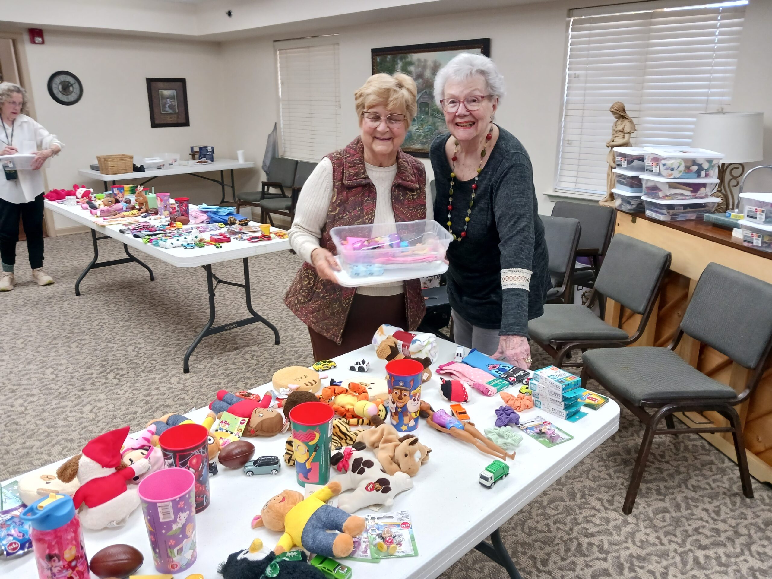 Two residents engaging in a craft activity.