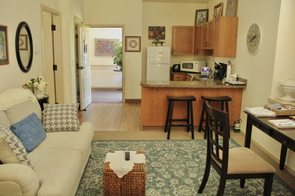 Cozy resident room with kitchen and sitting area