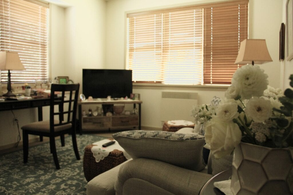Cozy interior of a resident's room with decor.