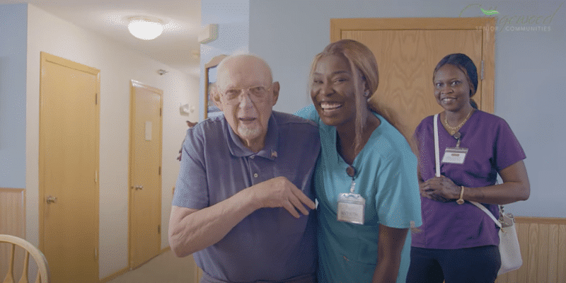 Staff member with resident in a common area