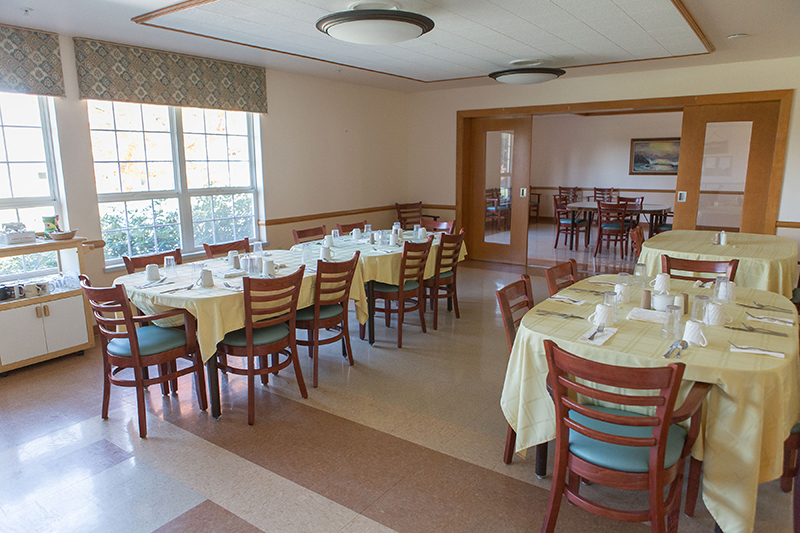 Dining area with tables set for a meal