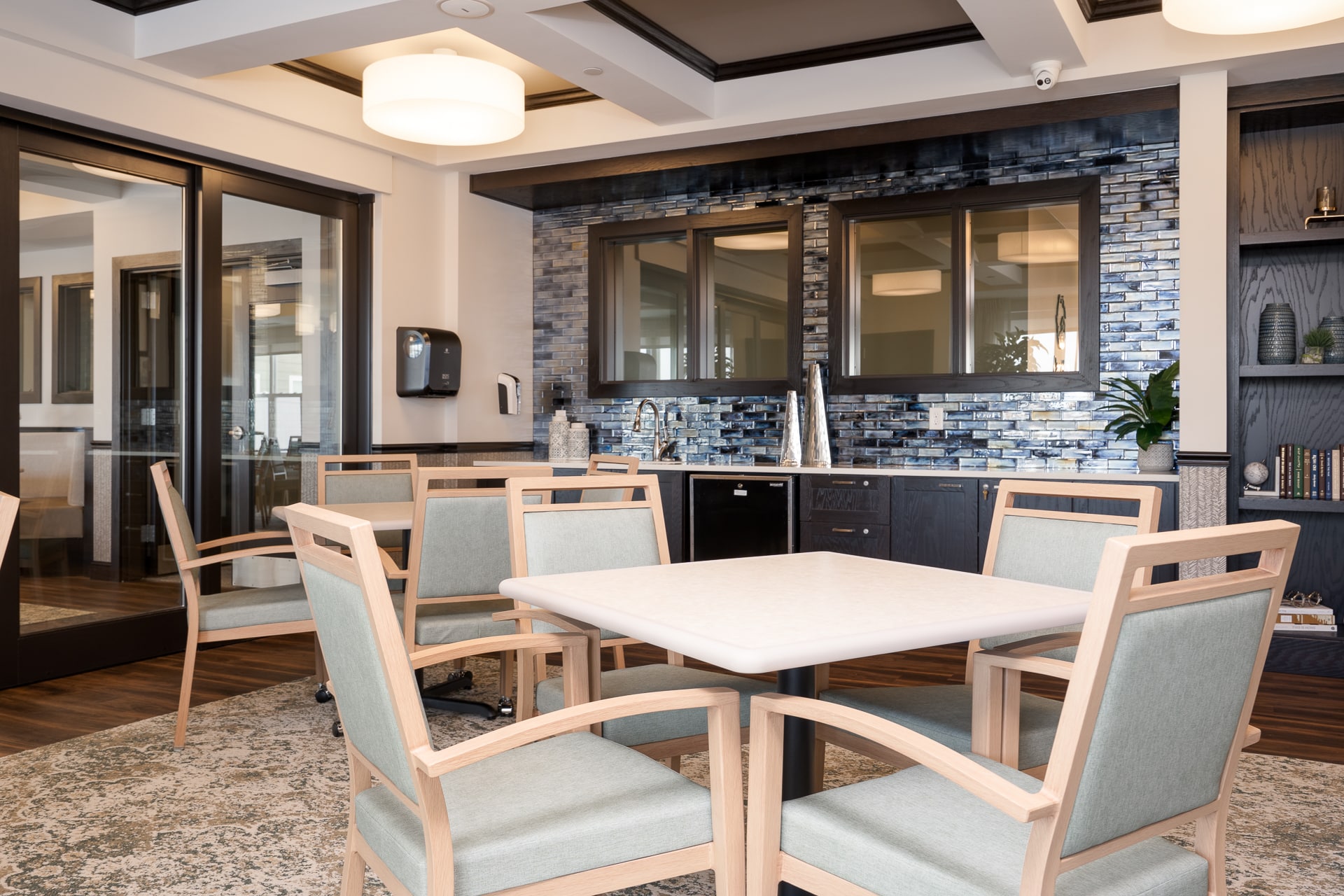 Well-furnished common area with seating and decor.