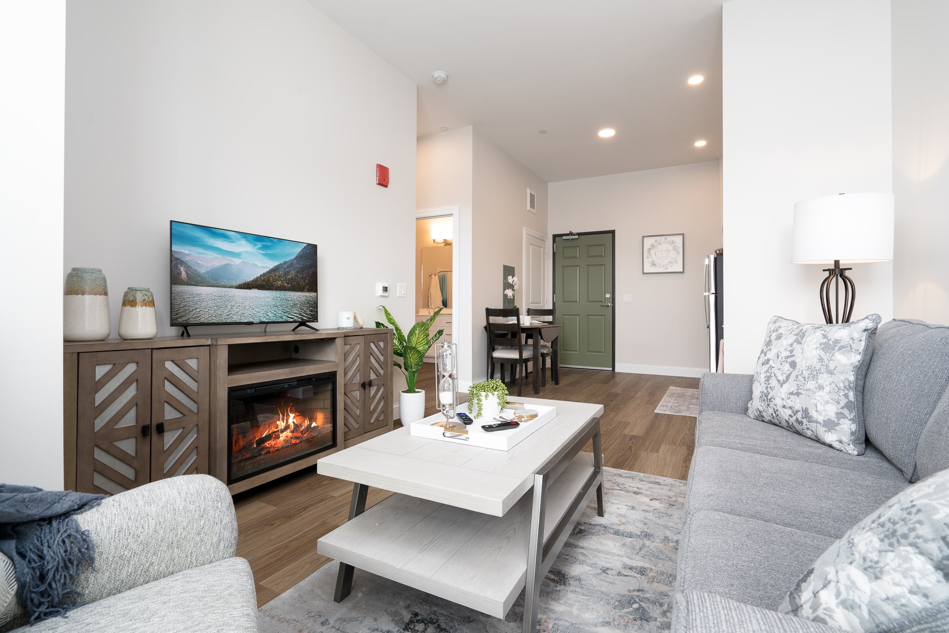 Modern living room with a cozy fireplace.