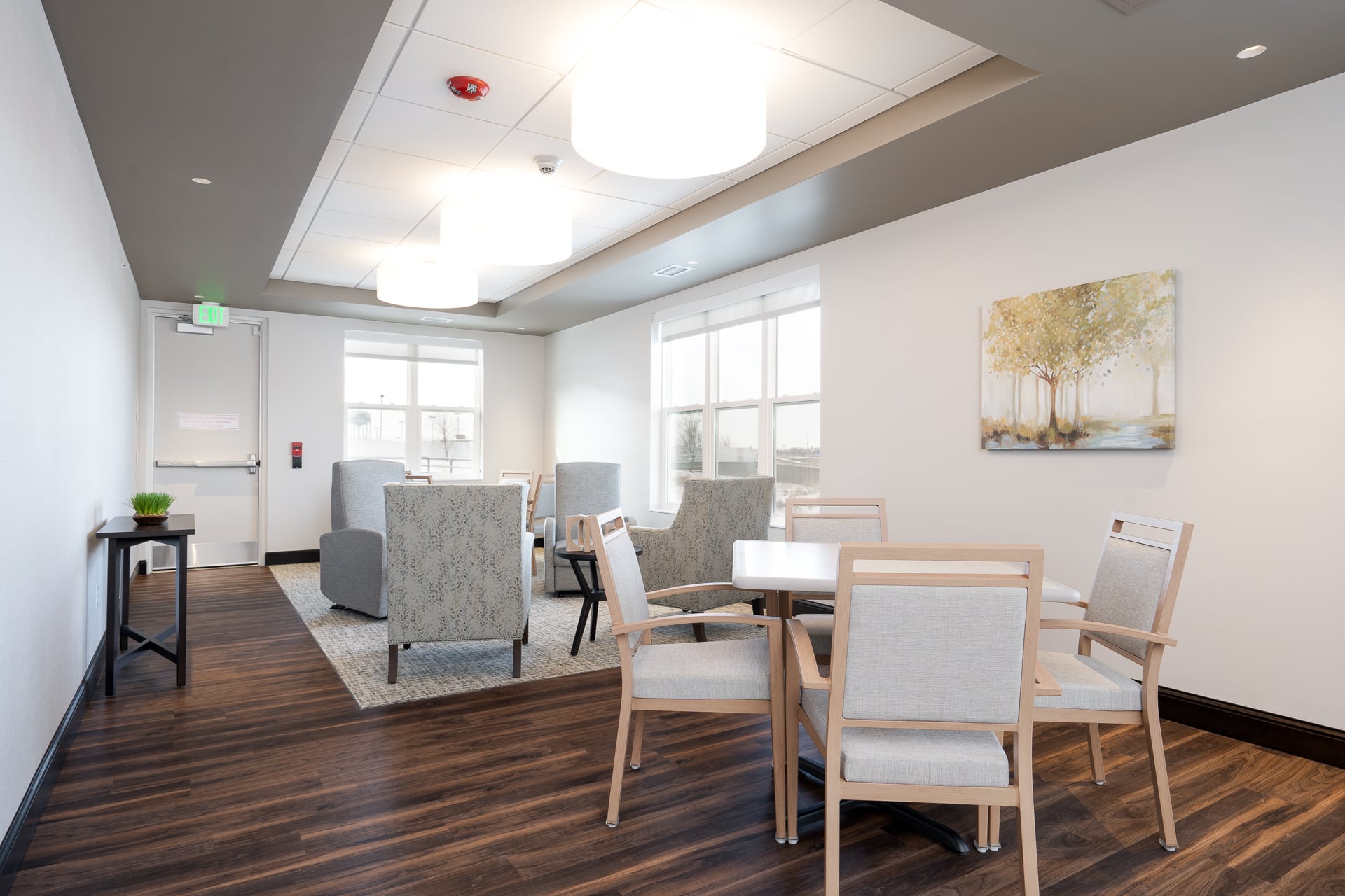 Bright common area with seating and artwork