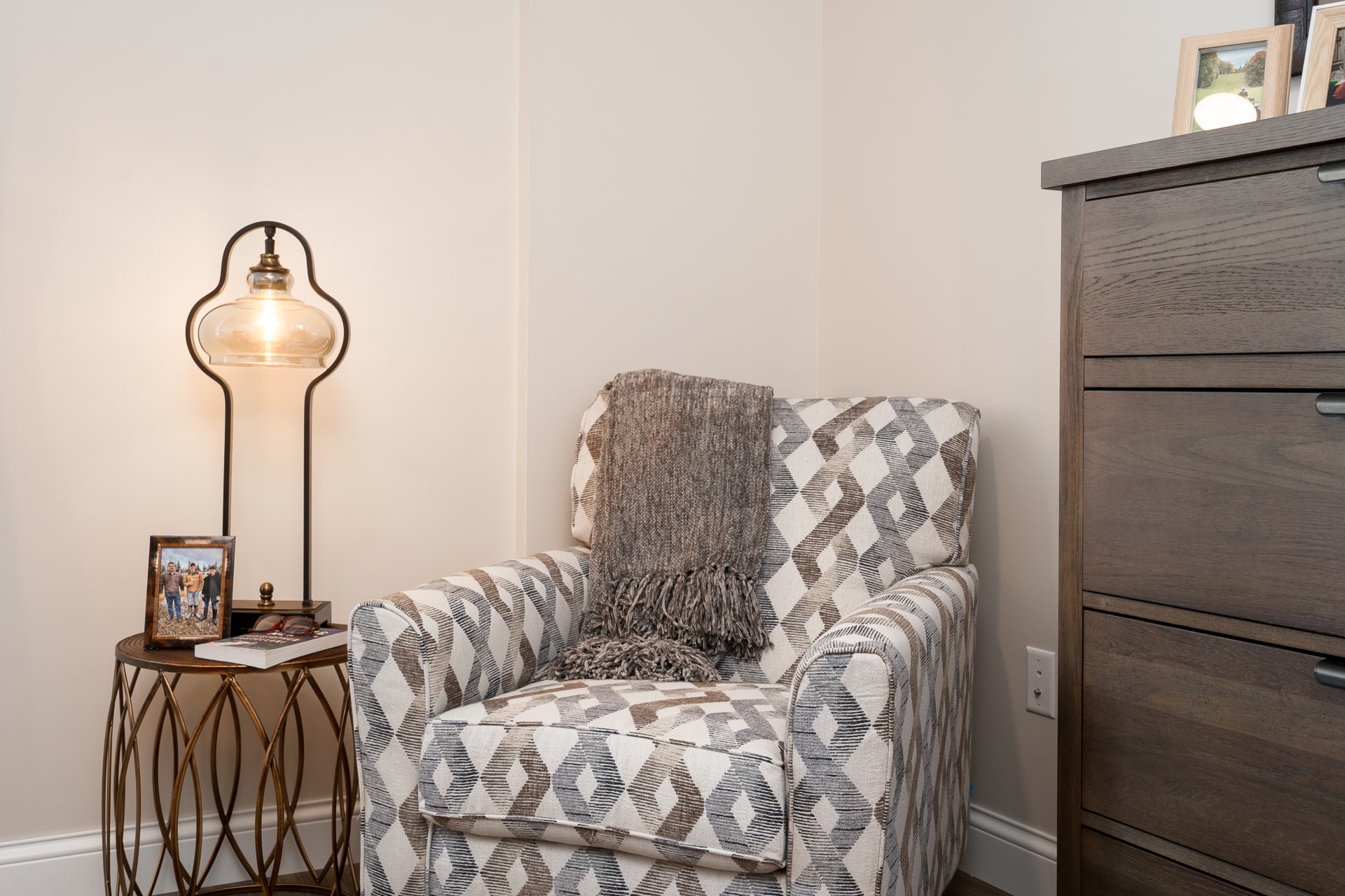 Cozy chair and lamp in a room setting