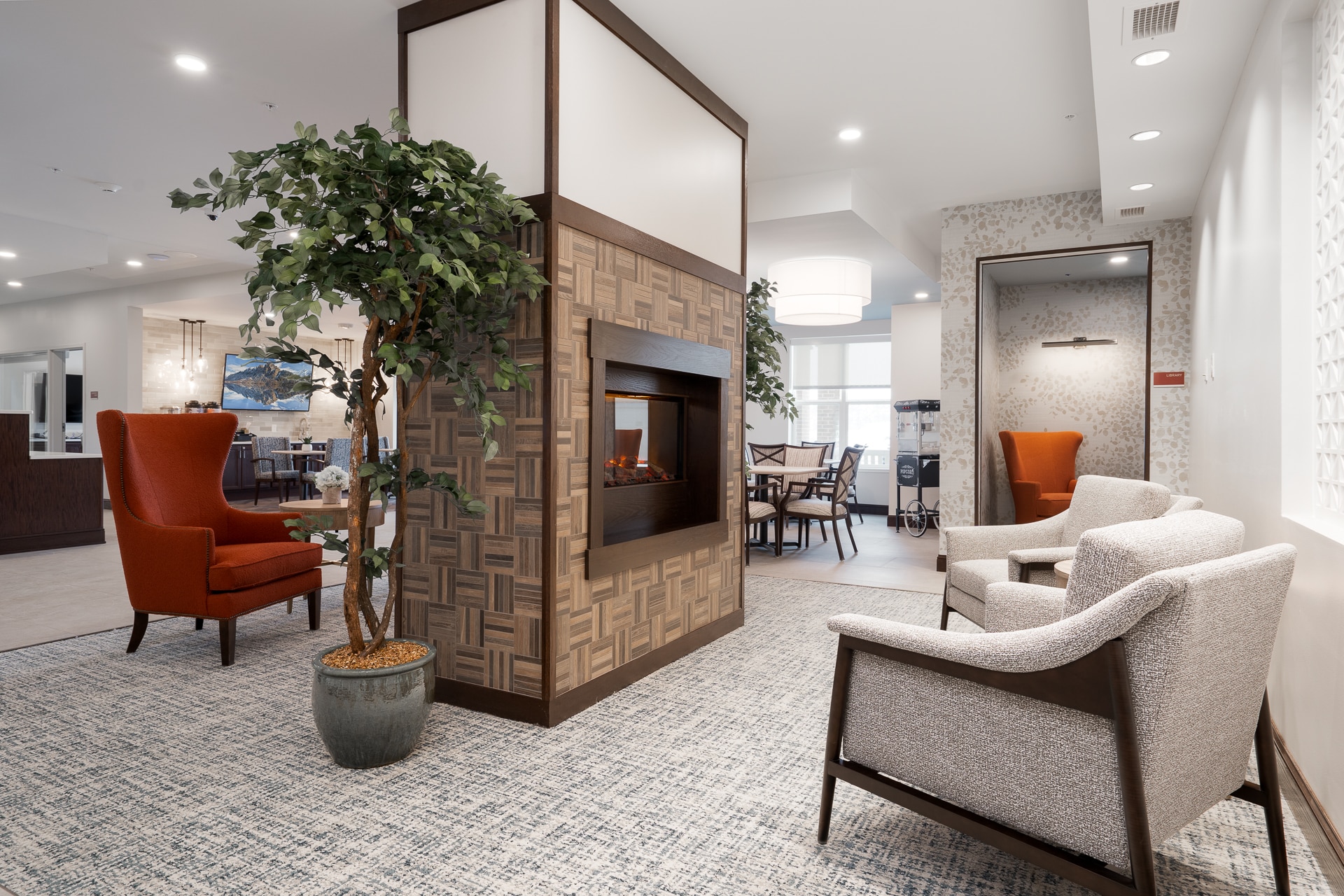 Common area with seating and fireplace